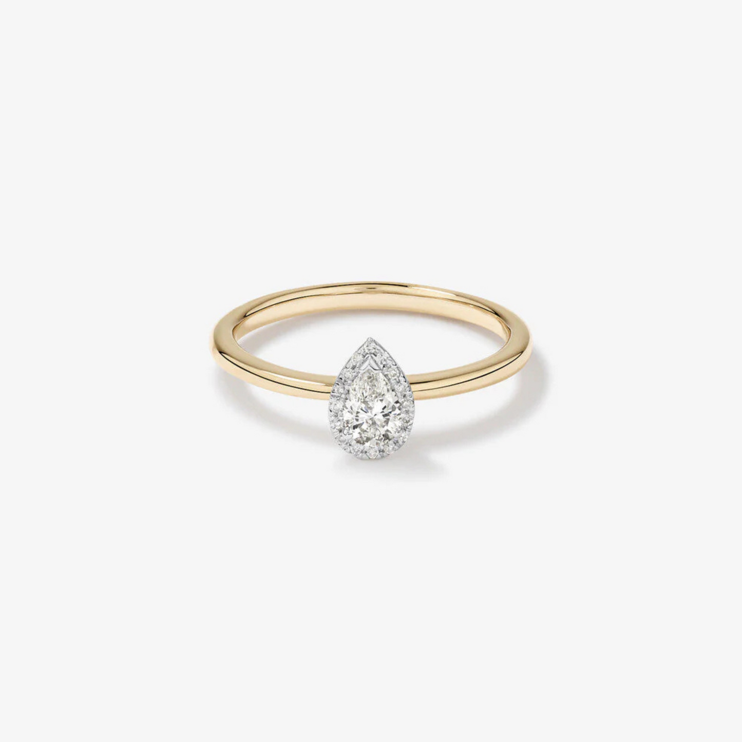 0.31 Carat TW Pear Cut Diamond Halo Engagement Ring in 14kt Yellow and White Gold