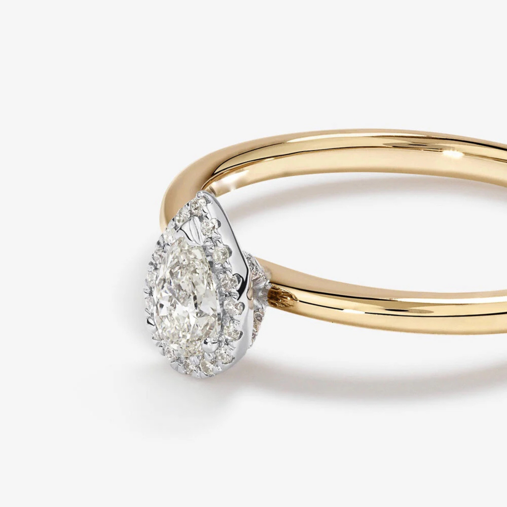 0.31 Carat TW Pear Cut Diamond Halo Engagement Ring in 14kt Yellow and White Gold