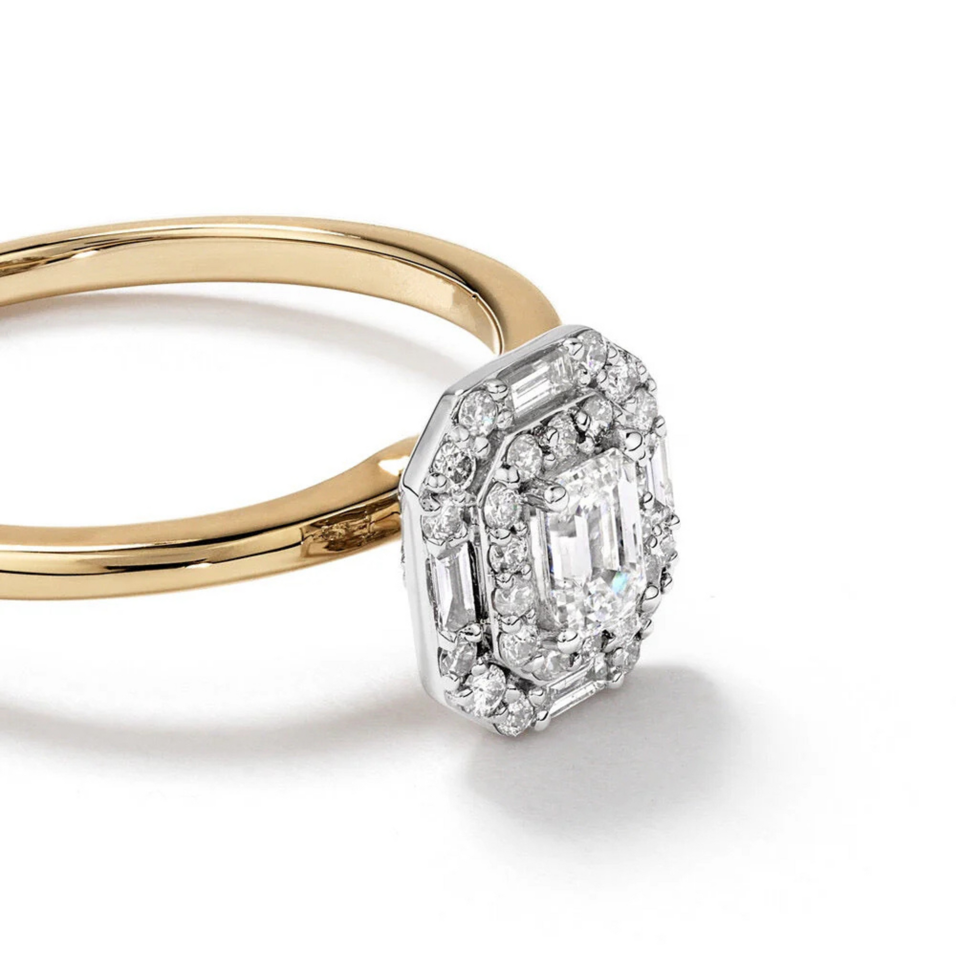 0.51 Carat TW Emerald Cut Diamond Baguette and Round Brilliant Halo Engagement Ring in 14kt Yellow and White Gold