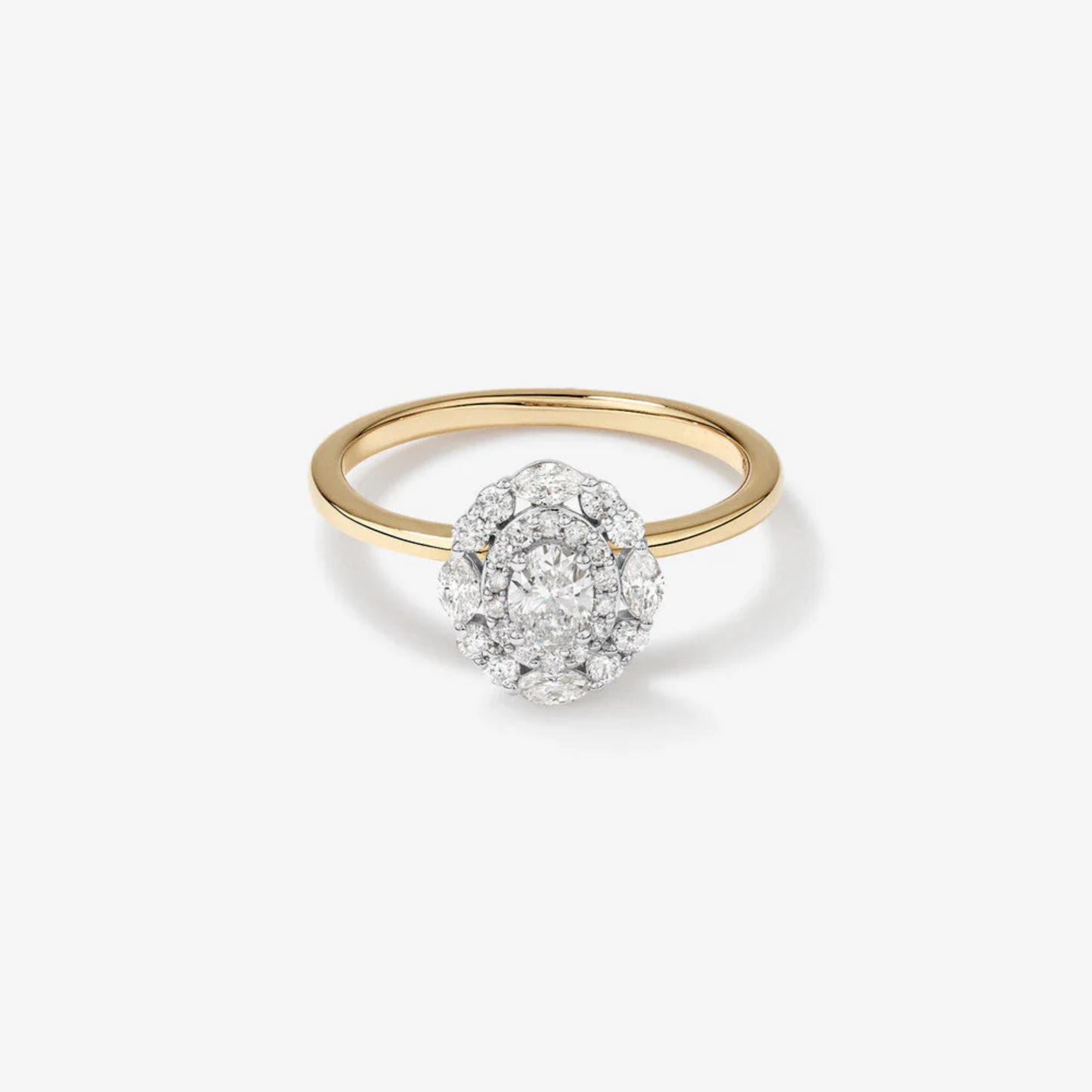 0.61 Carat TW Oval Cut Diamond Marquise and Round Brilliant Halo Engagement Ring in 14kt Yellow and White Gold