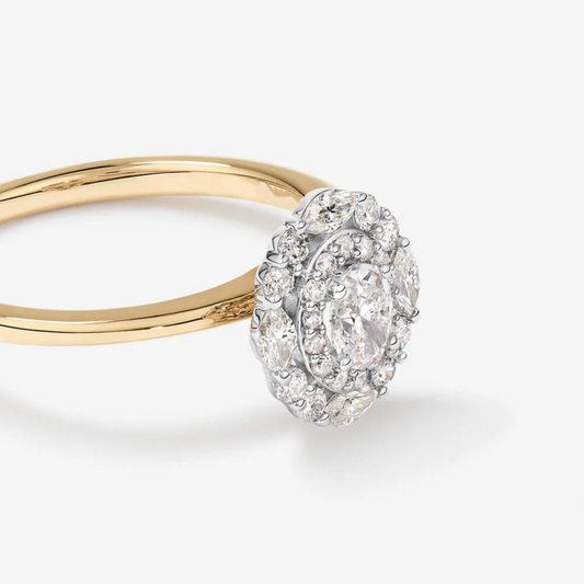 0.61 Carat TW Oval Cut Diamond Marquise and Round Brilliant Halo Engagement Ring in 14kt Yellow and White Gold