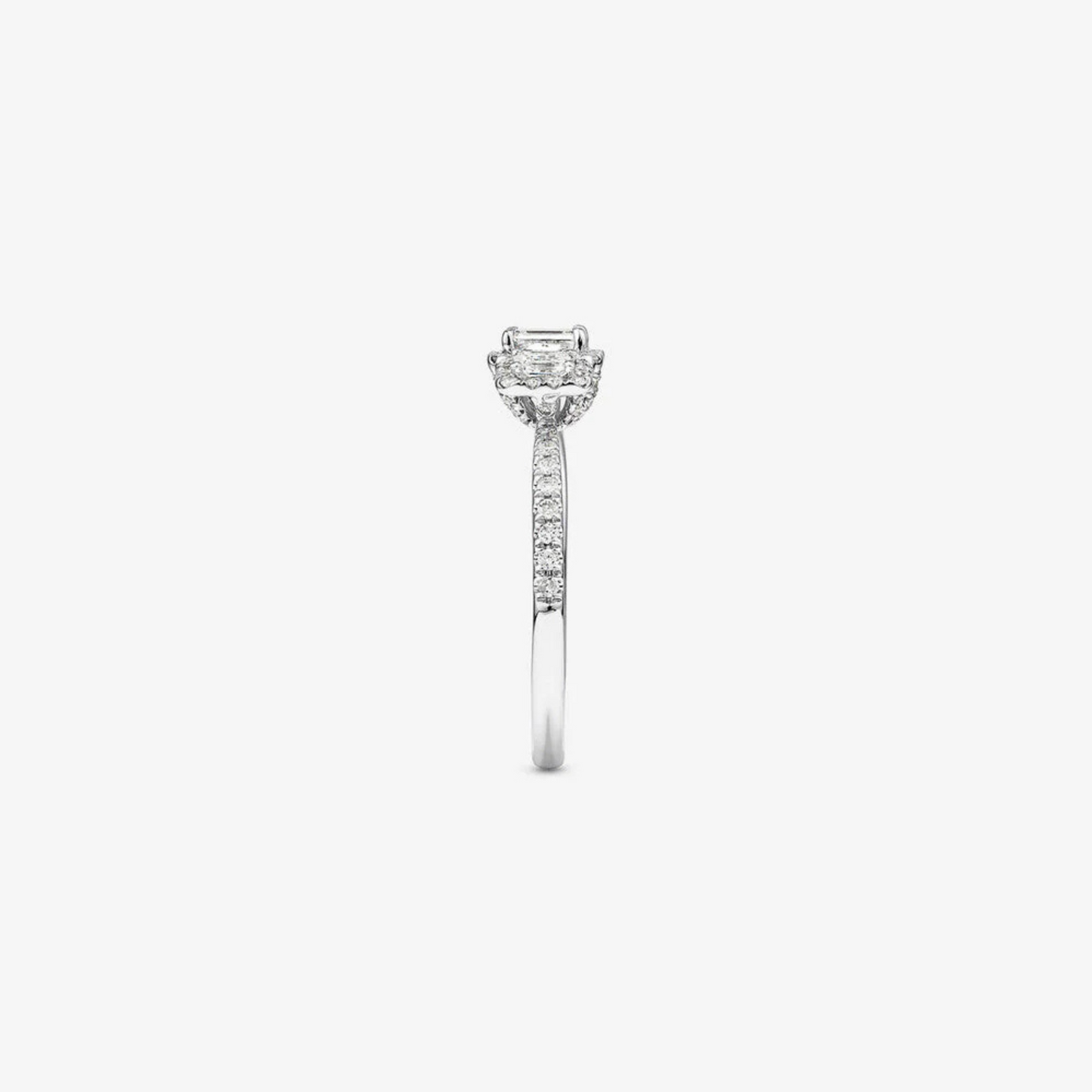 0.80 Carat TW Three Stone Emerald Cut Halo Engagement Ring in 14kt White Gold