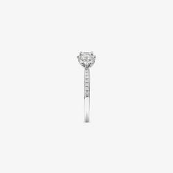 0.80 Carat TW Three Stone Emerald Cut Halo Engagement Ring in 14kt White Gold