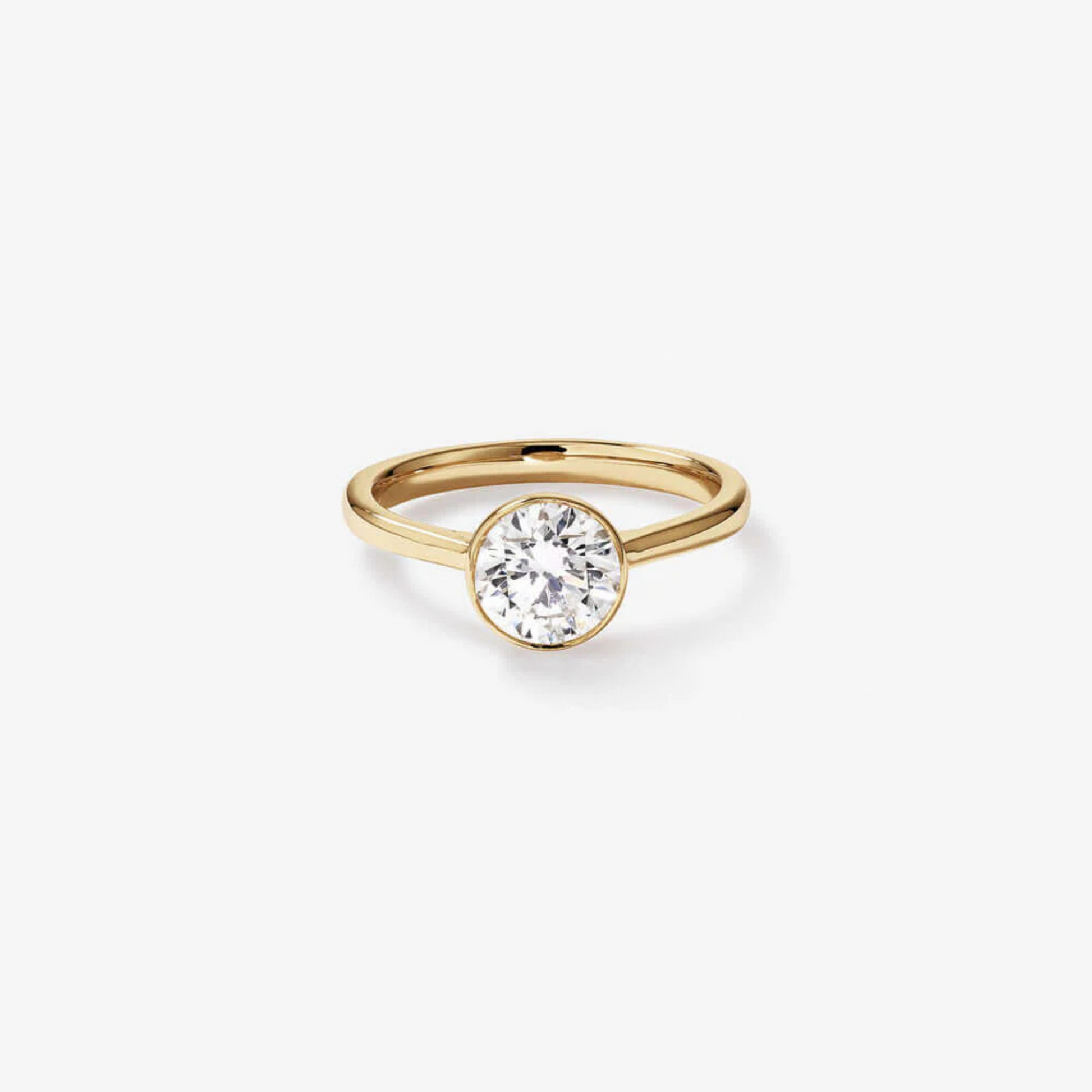 1.25 Carat TW Round Brilliant Laboratory-Grown Diamond Solitaire Bezel Set Engagement Ring in 14kt Yellow Gold
