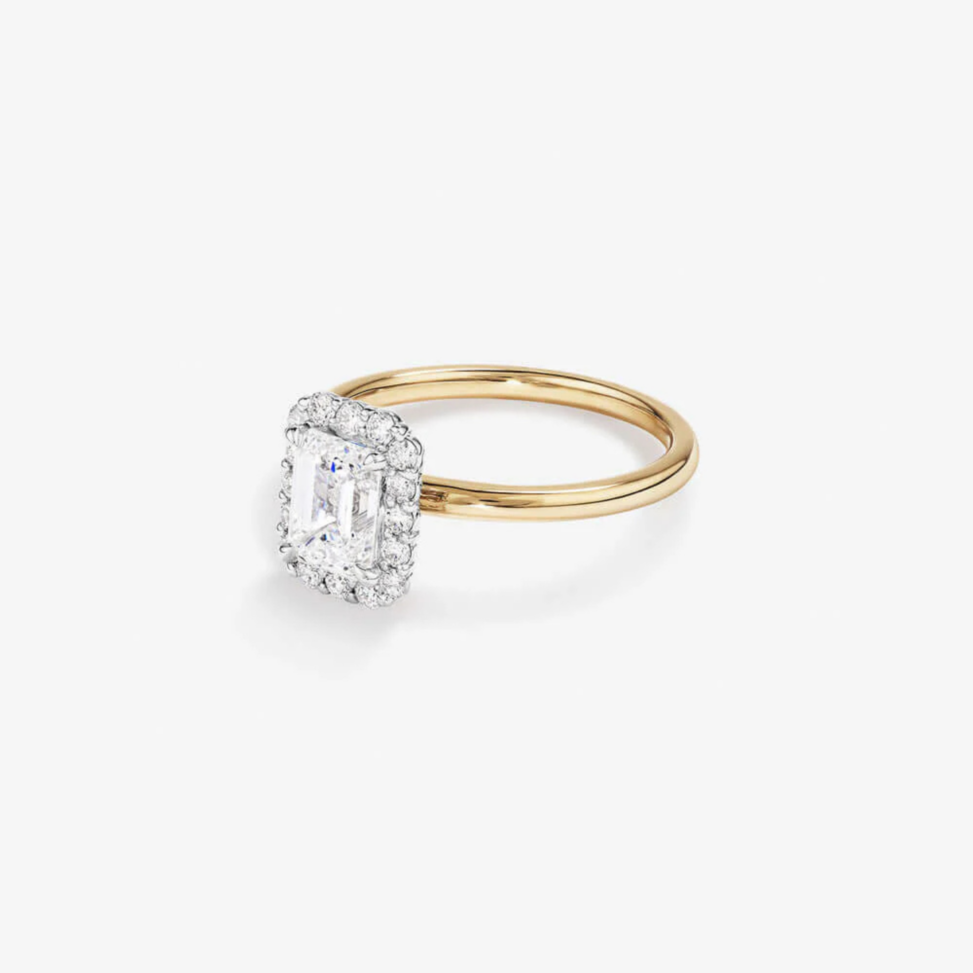 1.46 Carat TW Emerald Cut Laboratory-Grown Diamond Halo Engagement Ring in yellow and white gold.