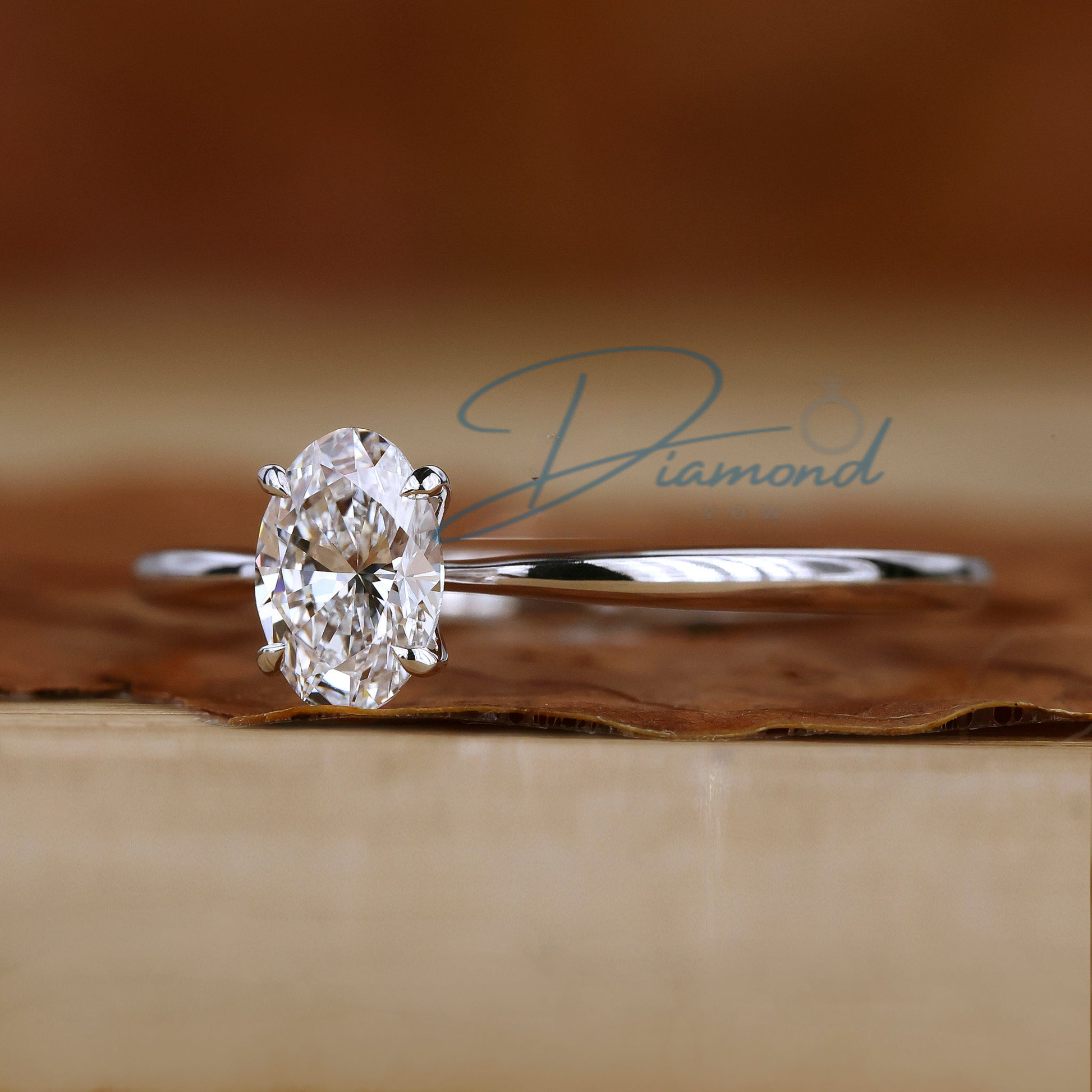 Oval Solitaire Engagement Ring with Tapered Shank
