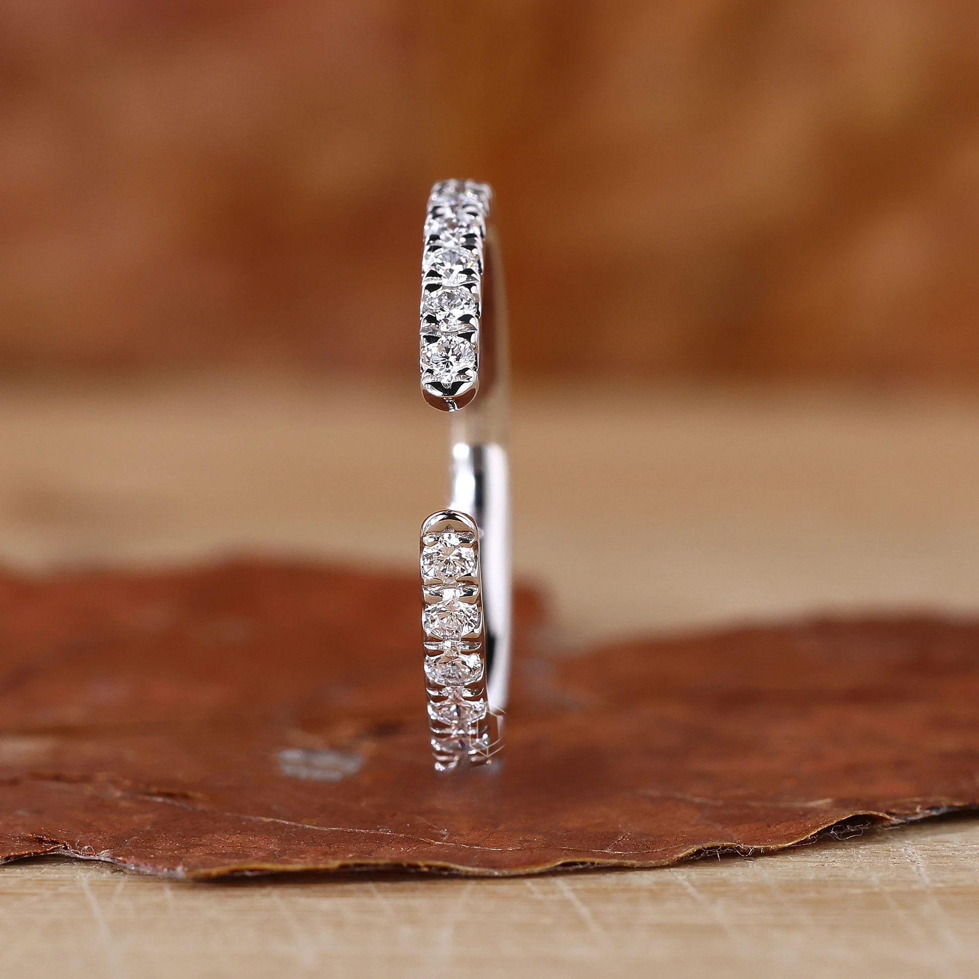 Open-Style Wedding Band Featuring a Round Diamond