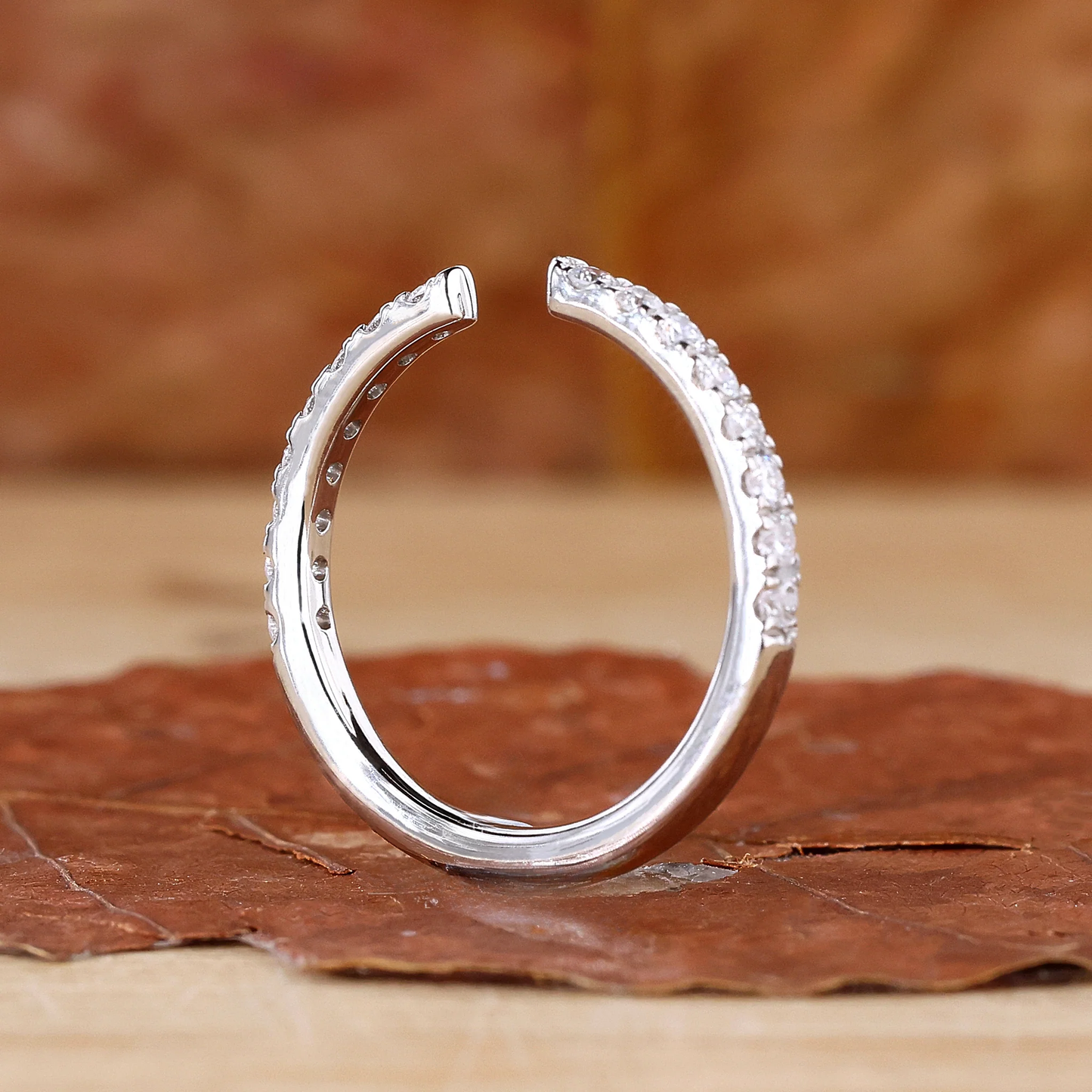 Open-Style Wedding Band Featuring a Round Diamond
