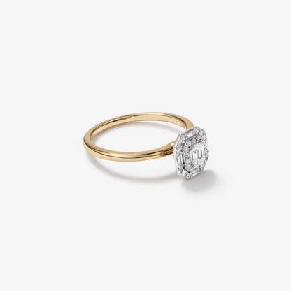 0.51 Carat TW Emerald Cut Diamond Baguette and Round Brilliant Halo Engagement Ring in 14kt Yellow and White Gold