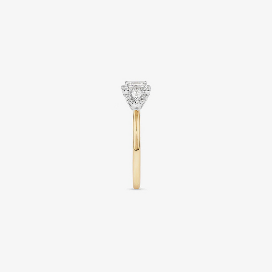 0.69 Carat TW Three Stone Emerald and Pear Cut Diamond Halo Engagement Ring in 14kt Yellow and White Gold