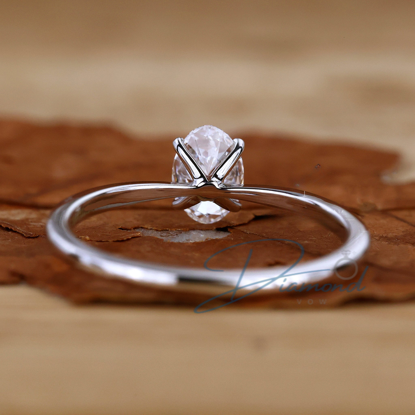 Oval Solitaire Engagement Ring with Tapered Shank