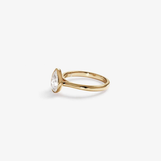 1.25 Carat TW Pear Cut Laboratory-Grown Diamond Solitaire Bezel Set Engagement Ring in 14kt Yellow Gold