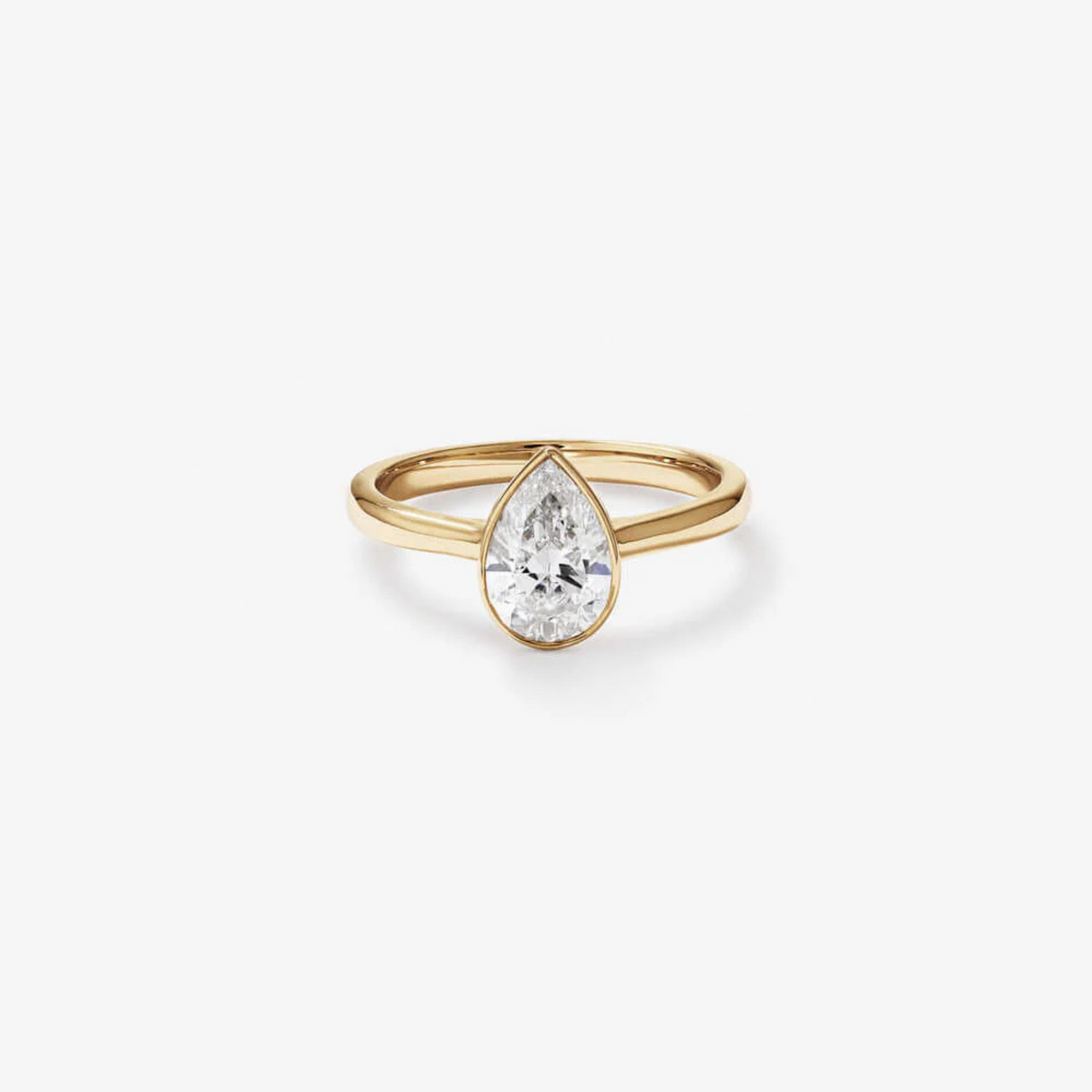 1.25 Carat TW Pear Cut Laboratory-Grown Diamond Solitaire Bezel Set Engagement Ring in 14kt Yellow Gold